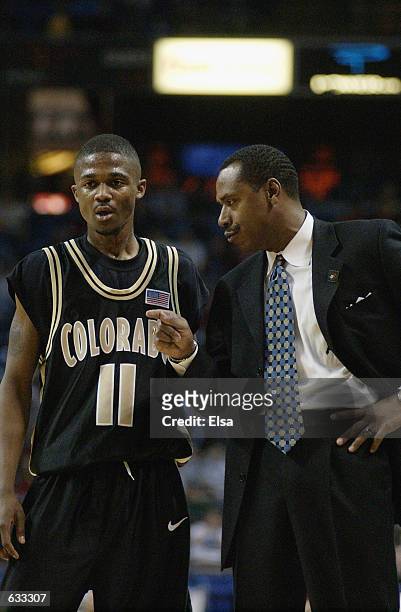 Head coach Ricardo Patton of the Colorado Buffaloes talks to James Wright during the Big XII Tournament game against the Nebraska Cornhuskers at...