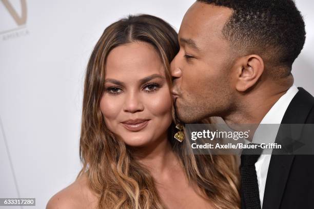 Model Chrissy Teigen and singer John Legend arrive at the 28th Annual Producers Guild Awards at The Beverly Hilton Hotel on January 28, 2017 in...