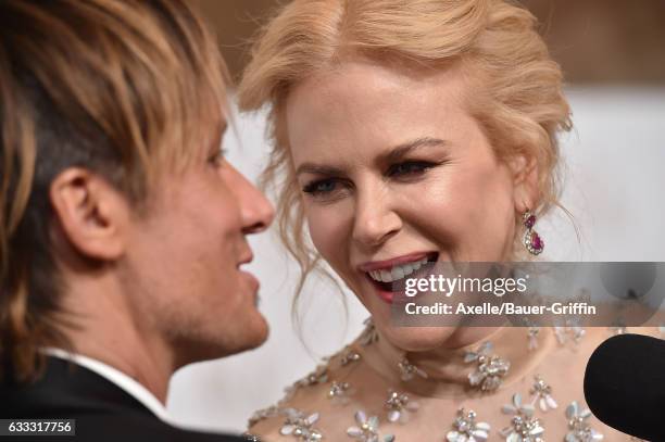 Musician Keith Urban and actress Nicole Kidman arrive at the 28th Annual Producers Guild Awards at The Beverly Hilton Hotel on January 28, 2017 in...