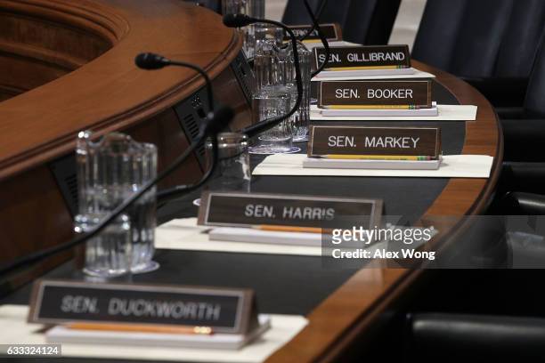 Name plates of Democratic members of the Senate Environment and Public Works Committee are placed on the dais next to empty chairs during a meeting...