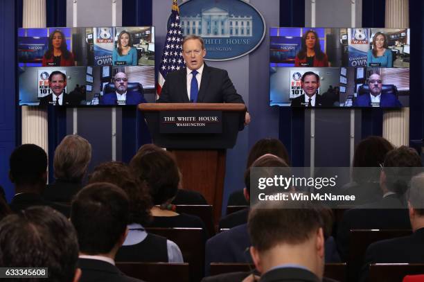 White House Press Secretary Sean Spicer answers questions from reporters via Skype on February 1, 2017 in Washington, DC. The "Skype Seats" in the...