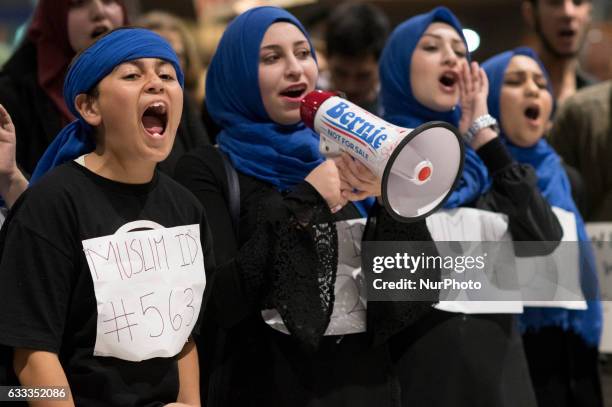 Demonstrators at Los Angeles International Airport protest against President Trump's executive order to ban entry into the US to travelers from seven...