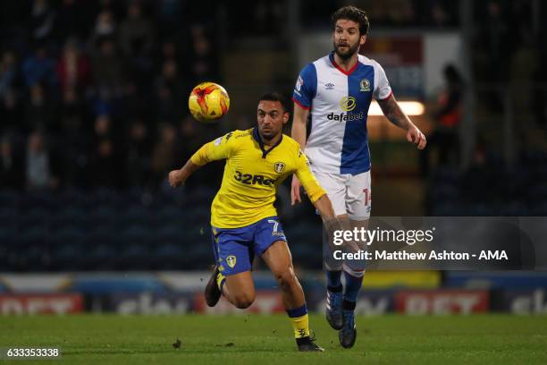 Kemar Roofe of Leeds United and Charlie Mulgrew of Blackburn Rovers during the Sky Bet Championship match between Blackburn Rovers and Leeds United...