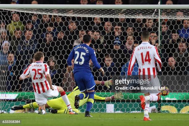 Peter Crouch of Stoke City scores the opening goal during the Premier League match between Stoke City and Everton at the Bet365 Stadium on February...