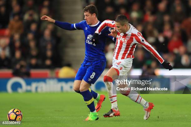 Ibrahim Afellay of Stoke City closes down Ross Barkley of Everton during the Premier League match between Stoke City and Everton at Bet365 Stadium on...