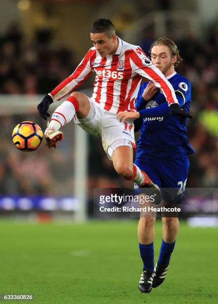 Ibrahim Afellay of Stoke City controlls the ball as Tom Davies of Everton closes him down during the Premier League match between Stoke City and...