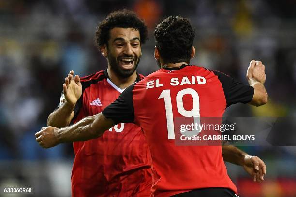 Egypt's forward Mohamed Salah celebrates with Egypt's forward Abdallah Said after scoring a goal during the 2017 Africa Cup of Nations semi-final...