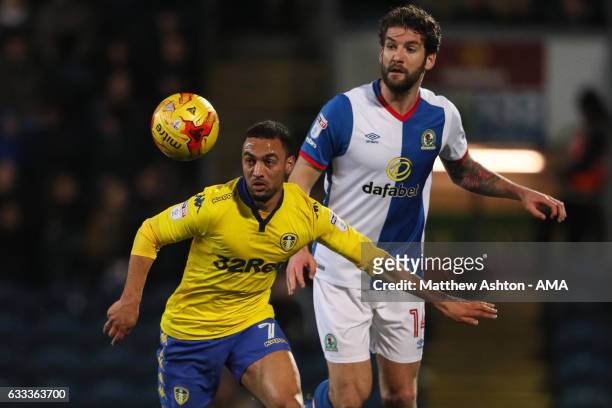 Kemar Roofe of Leeds United and Charlie Mulgrew of Blackburn Rovers during the Sky Bet Championship match between Blackburn Rovers and Leeds United...