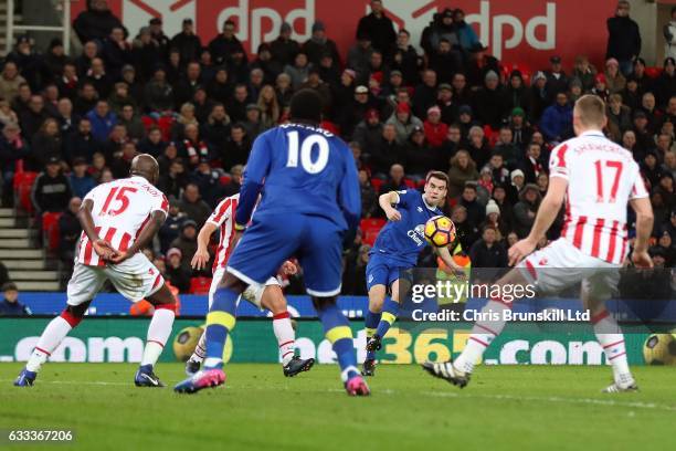 Seamus Coleman of Everton shoots at goal in the build up to an own goal by Ryan Shawcross of Stoke City during the Premier League match between Stoke...