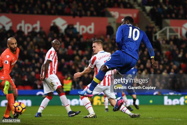 Romelu Lukaku of Everton watches as the ball flies in to the net deflected by Ryan Shawcross of Stoke City during the Premier League match between...