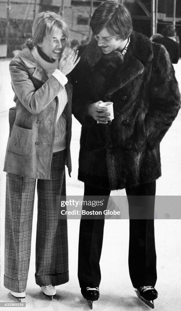 Boston Bruins player Bobby Orr and his wife Peggy at a Bruins party