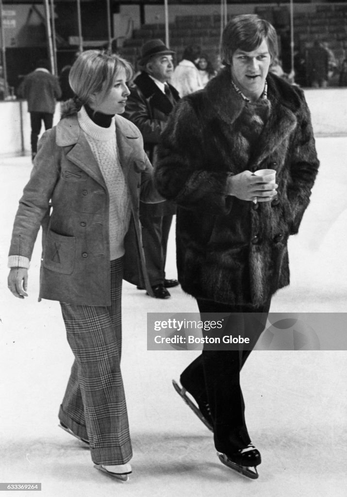 Boston Bruins player Bobby Orr and his wife Peggy at a Bruins party