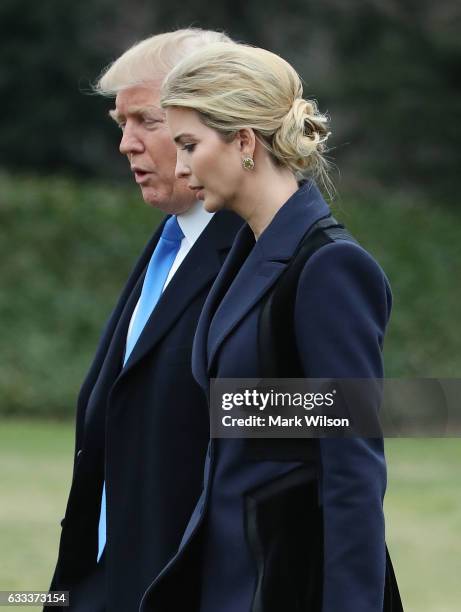 President Donald Trump and his daughter Ivanka Trump walk toward Marine One while departing from the White House, on February 1, 2017 in Washington,...