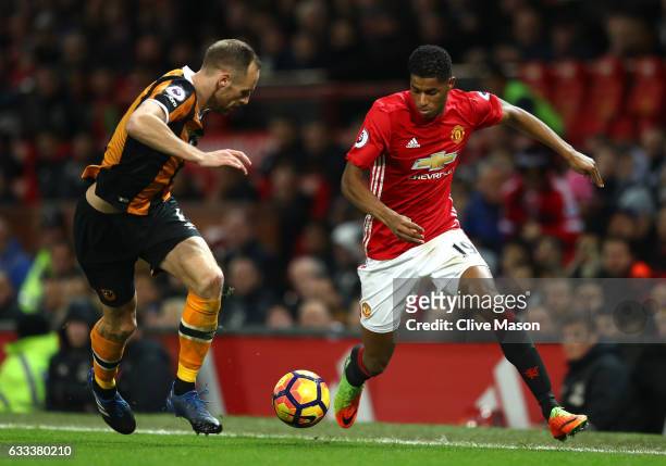 Marcus Rashford of Manchester United takes on David Meyler of Hull City during the Premier League match between Manchester United and Hull City at...
