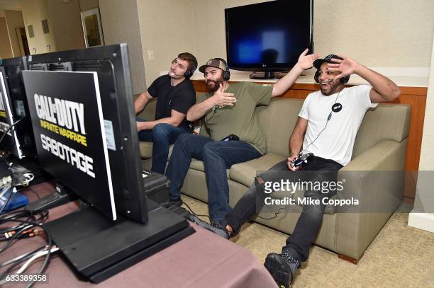 Pro football players Golden Tate and Joey Bosa play Call of Duty: Infinite Warfare Sabotage DLC with Hike the Gamer on February 1, 2017 in Houston,...