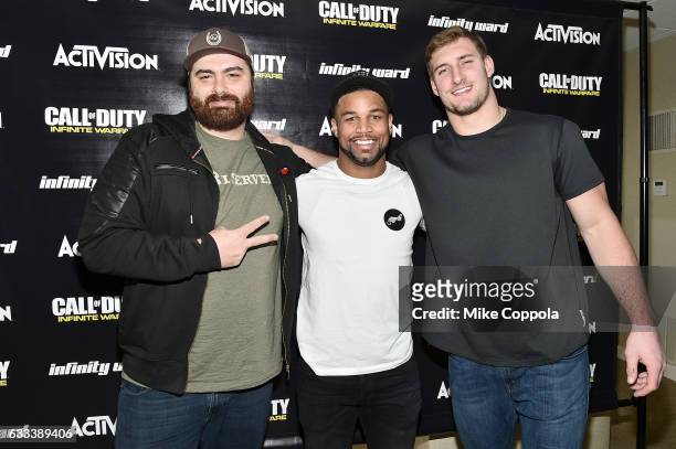 Pro football players Golden Tate and Joey Bosa play Call of Duty: Infinite Warfare Sabotage DLC with Hike the Gamer on February 1, 2017 in Houston,...