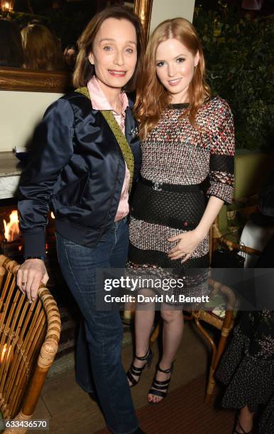 Dame Kristin Scott Thomas and Ellie Bamber attend as PORTER hosts a private dinner in honour of Yana Peel at Mark's Club on February 1, 2017 in...