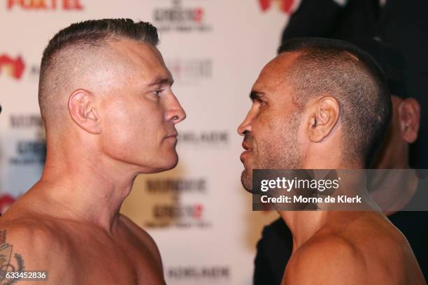 Australian boxers Danny Green and Anthony Mundine face off during the official weigh in ahead of their Friday night bout at Adelaide Oval on February...