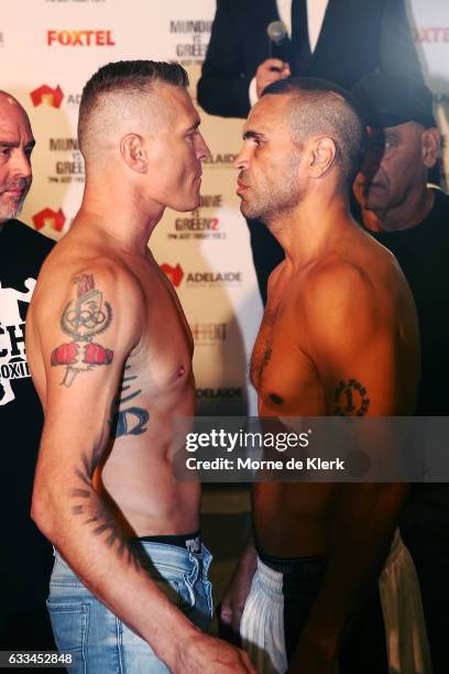 Australian boxers Danny Green and Anthony Mundine face off during the official weigh in ahead of their Friday night bout at Adelaide Oval on February...