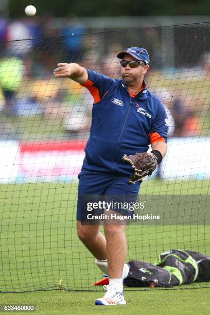 Batting coach Craig McMillan of New Zealand takes his players through warm-up drills during game two of the One Day International series between New...