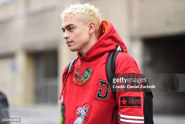 Model is seen wearing a red patched hoodie outside of the Rochambeau show during New York Fashion Week: Men's AW17 on February 1, 2017 in New York...