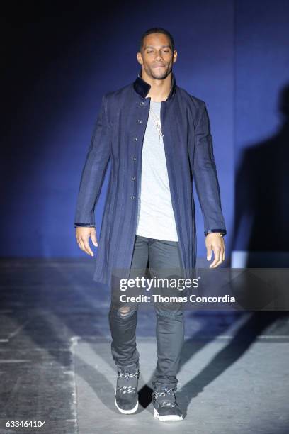 Eric West walks the runway during The Blue Jacket Fashion Show at NYFW: Men's at Pier 59 on February 1, 2017 in New York City.