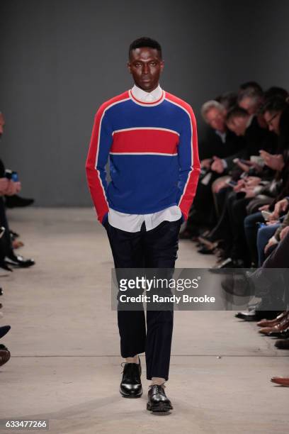 Model walks the runway during the Todd Snyder NYFW: Men's show at Skylight Clarkson North on February 1, 2017 in New York City.