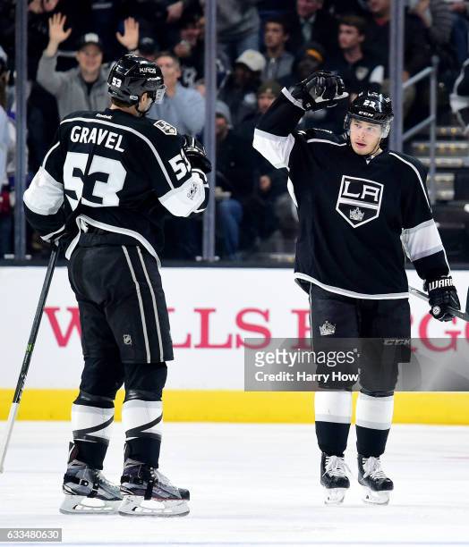 Dustin Brown of the Los Angeles Kings celebrates his goal with Kevin Gravel to take a 4-0 lead over the Colorado Avalanche during the third period at...