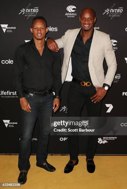 Michael Frater and Asafa Powell arrive ahead of the Nitro Athletics Gala Dinner at Crown Palladium on February 2, 2017 in Melbourne, Australia.