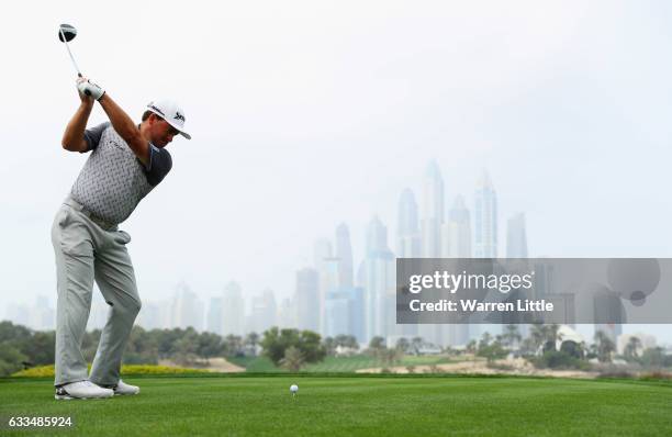 Graeme McDowell of Northern Ireland tees off on the 8th hole during the first round of the Omega Dubai Desert Classic at Emirates Golf Club on...