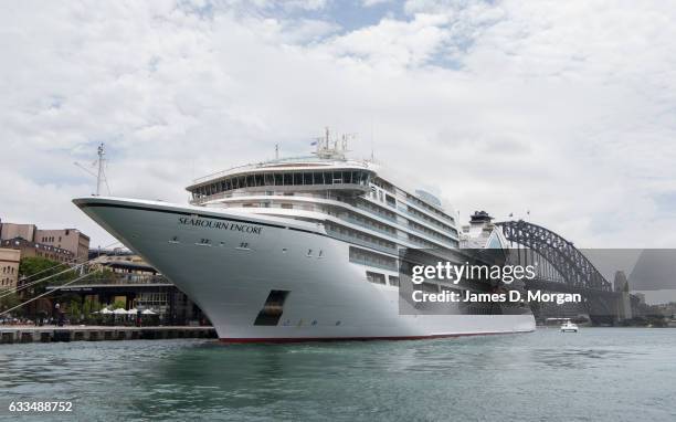 The ultra-luxurious Seabourn Encore berthed at the Oversea Passenger Terminal with the Sydney Opera House and Sydney Harbour Bridge as a background...