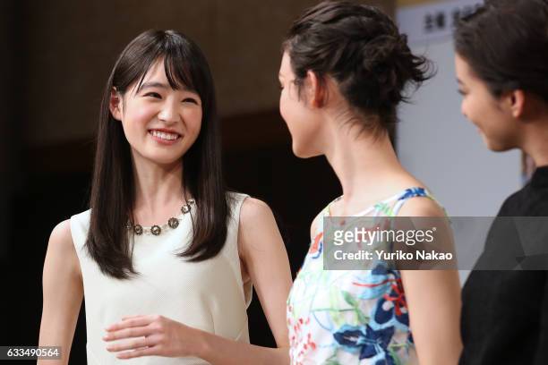 Hikaru Takahashi smiles as Ayame Goriki and Emi Takei look on during the press conference for the 15th National Pretty Young Girl Contest on February...