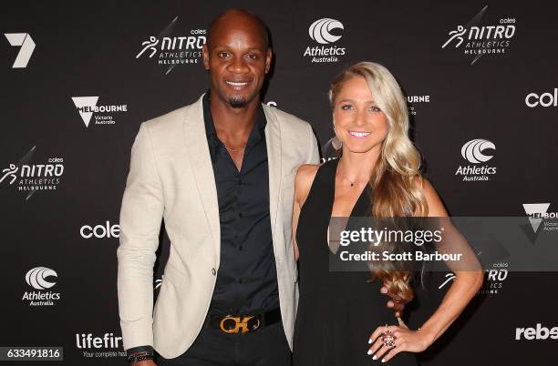 Asafa Powell and Genevieve LaCaze arrive ahead of the Nitro Athletics Gala Dinner at Crown Palladium on February 2, 2017 in Melbourne, Australia.