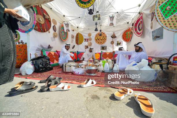 Group of local men enjoys a traditional food and coffee in side a tent, in Ras Al Khaimah. On Wednesday, 1st February in Ras Al Khaimah, UAE.