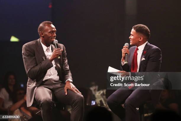 Usain Bolt speaks with John Steffensen on stage during the Nitro Athletics Gala Dinner at Crown Palladium on February 2, 2017 in Melbourne, Australia.