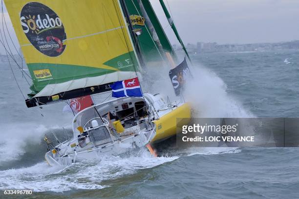 French skipper Louis Burton's Imoca monohull "Bureau Vallee" crosses the finish line to place 7th in the Vendee Globe solo around-the-world sailing...