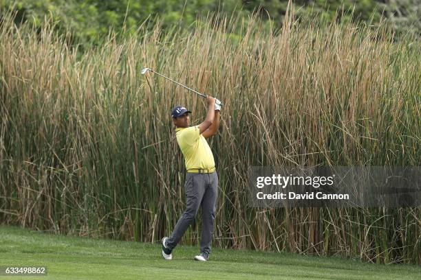 Anirban Lahiri of India plays his second shot on the par 4, ninth hole during the first round of the 2017 Omega Dubai Desert Classic on the Majlis...