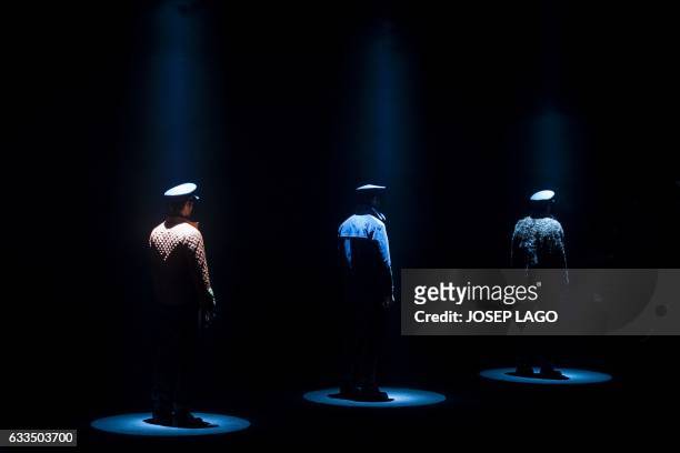 Model presents a creation by Torras during the 080 Barcelona Fashion Week in Barcelona on February 2, 2017. / AFP / Josep Lago