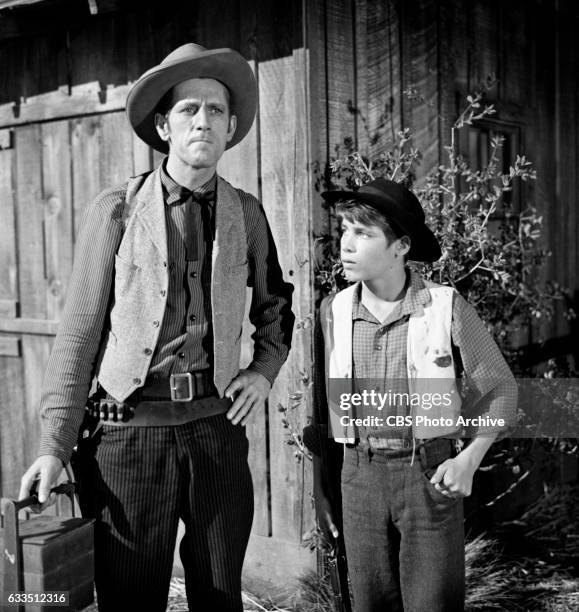 Dick Powells Zane Grey Theater production of the episode Rebel Ranger featuring from left: John Anderson and Don Grady . Image dated October 16,...