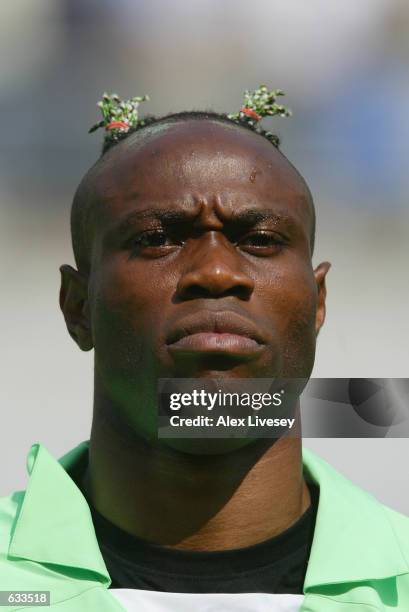 Taribo West of Nigeria in the team line up for the National Anthems before the Group F match between Nigeria and Argentina of the World Cup Group...