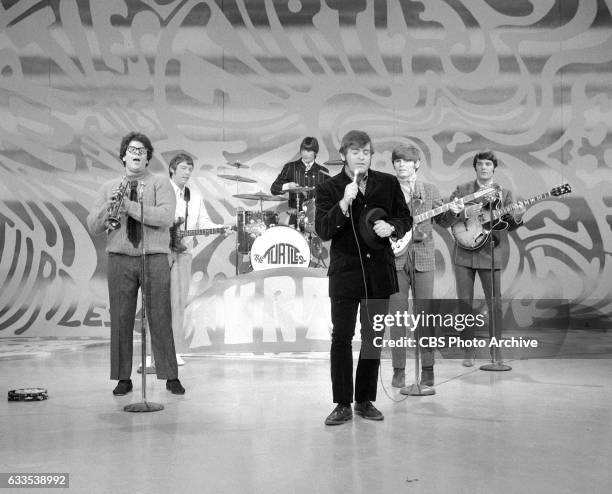 Music group The Turtles perform the song Happy Together on The Ed Sullivan Show on Sunday, May 14, 1967. The Turtles are Mark Volman ; Jim Pons ;...
