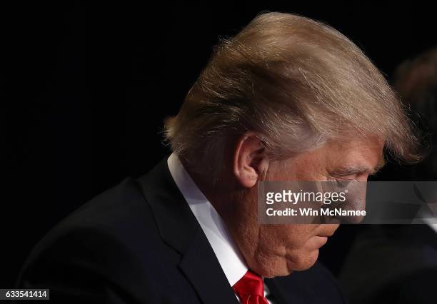 President Donald Trump bows his head in prayer while attending the National Prayer Breakfast February 2, 2017 in Washington, DC. Every U.S. President...