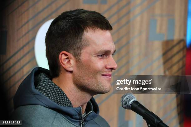 New England Patriots quarterback Tom Brady gets emotional as he answers questions during Super Bowl Opening Night on January 30 at Minute Maid Park...