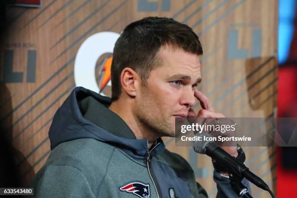 New England Patriots quarterback Tom Brady answers questions during Super Bowl Opening Night on January 30 at Minute Maid Park in Houston, Texas.