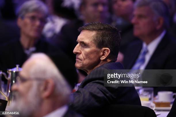 National Security Adviser Michael Flynn listens to remarks at the National Prayer Breakfast where U.S. President Donald Trump spoke February 2, 2017...