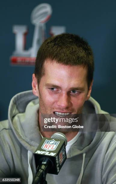 New England Patriots quarterback Tom Brady is pictured at the podium. The New England Patriots held a press availability at their hotel in Houston,...