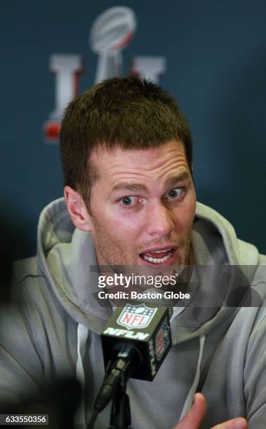 New England Patriots quarterback Tom Brady is pictured at the podium. The New England Patriots held a press availability at their hotel in Houston,...