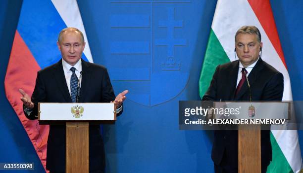 Russian President Vladimir Putin and Hungarian Prime Minister Viktor Orban give a joint press conference on February 2, 2017 in Budapest. - The...