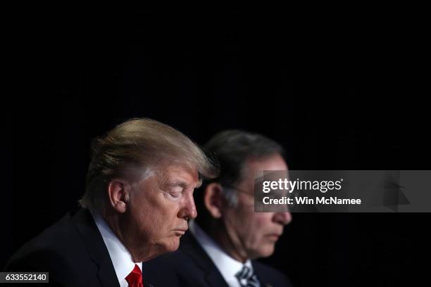 President Donald Trump bows his head in prayer while attending the National Prayer Breakfast February 2, 2017 in Washington, DC. Every U.S. President...