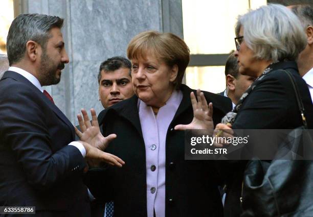 German Chancellor Angela Merkel and Ahmet Aydin , Deputy Speaker of the Turkish Grand National Assembly, visit a part of the Turkish Parliament...